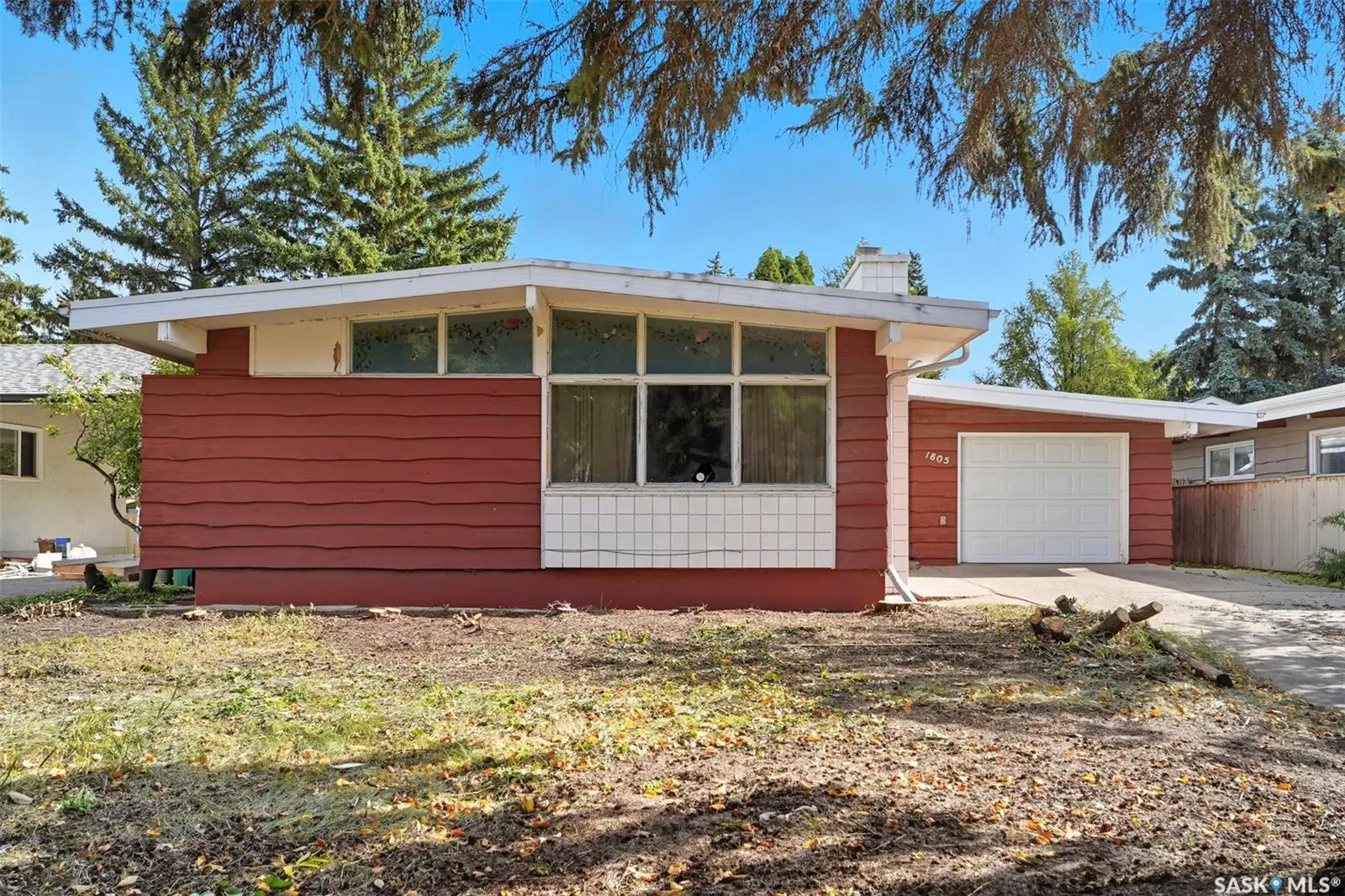 Exterior photo of 1805 Madden Avenue, Saskatoon, SK bungalow located in Brevoort Park.